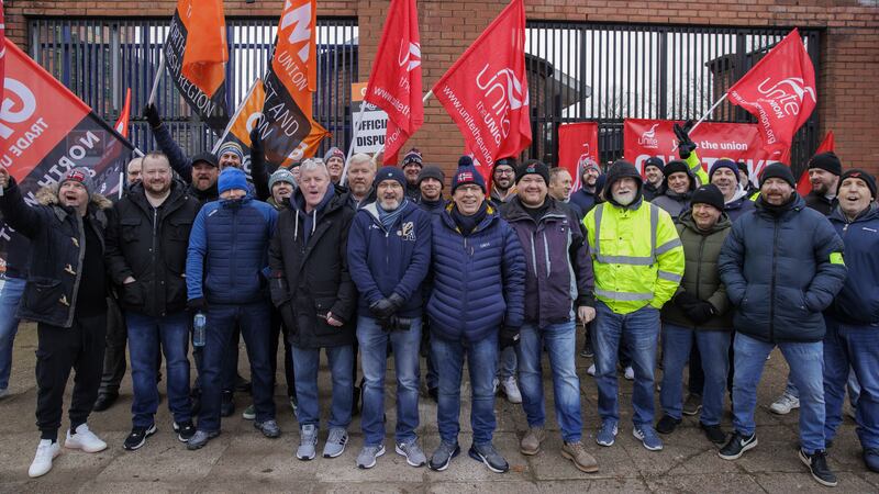 Members of Unite the Union and GMB on a picket line at Translink’s Europa Bus Station in Belfast during a 24-hour dispute over pay on December 1 (PA)