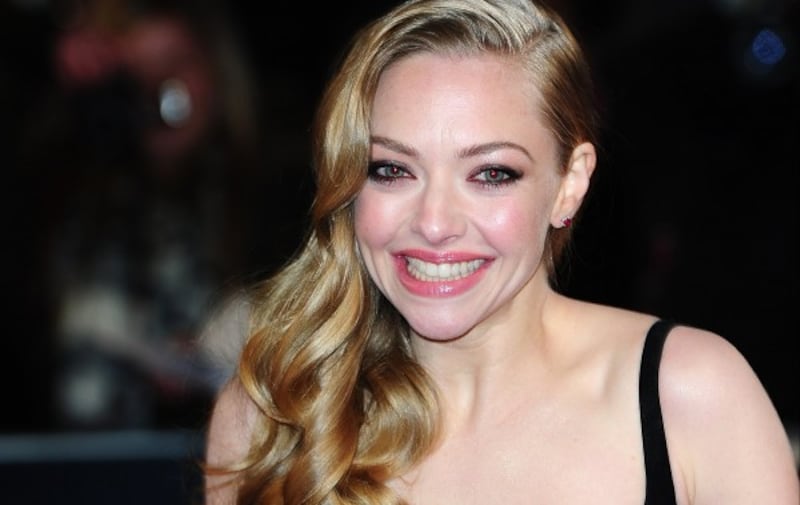 Amanda Seyfried arrives at the premiere of Les Miserables at the Empire Leicester Square, London, UK