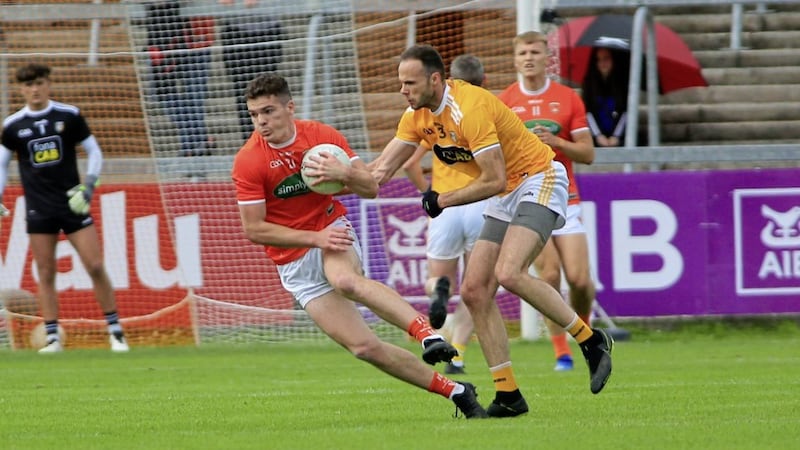 Armaghs Jarlath Og Burns in action with Antrim&#39;s Ricky Johnston during their Ulster SFC quarter-finals at the Athletic Grounds. The Orchardmen must make sure their concentration levels and focus at training is ideal as they prepare to face Monaghan in the Ulster semi-final on July 17 Picture: Seamus Loughran 