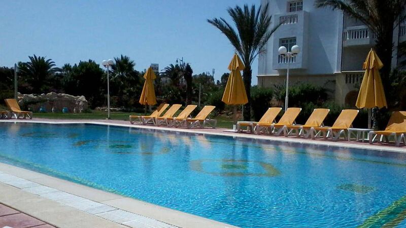 GUN ATTACK: Empty deck chairs around a pool at Hotel Belisaire in Hammamet, Tunisia Picture: Heidi Barlow/PA 