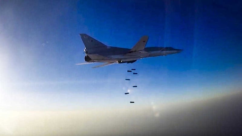A Russian long-range bomber Tu-22M3 flies during an air strike over Aleppo region of Syria. Picture by Russian Defence Ministry Press Service. Associated Press&nbsp;