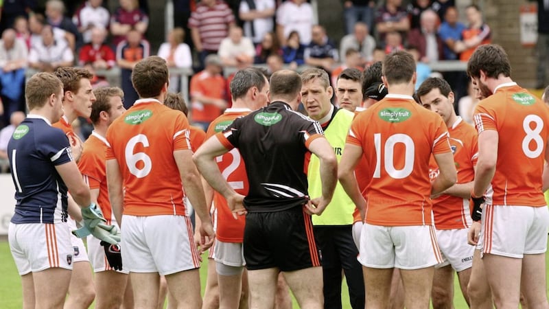 Armagh&#39;s Kieran McGeeney talks to his players during the 2015 All-Ireland Senior Football Qualifying Round 2 clash against Galway at the Athletic Grounds in Armagh. Picture by Colm O&#39;Reilly. 