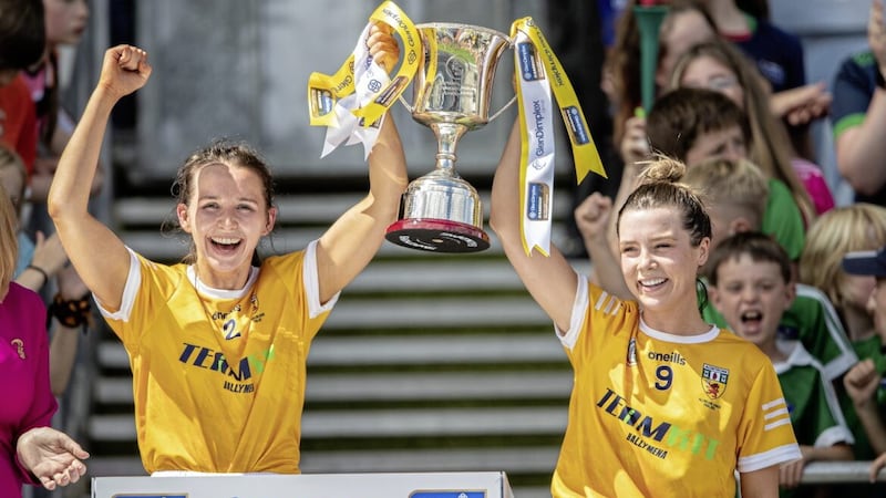 Antrim&#39;s Maria McLarnon and Emma Laverty lift the Kay Mills Cup for Antrim after their win over Armagh in the All-Ireland Premier Junior Championship final at Croke Park. Laverty (right) is one of three Antrim players nominated for Junior Player of the Year at the PWC GPA Camogie Allstars. Goalkeeper Aine Graham and full-forward Dervla Cosgrove are the other two Saffrons in the running for the award Picture: Evan Treacy/Inpho 