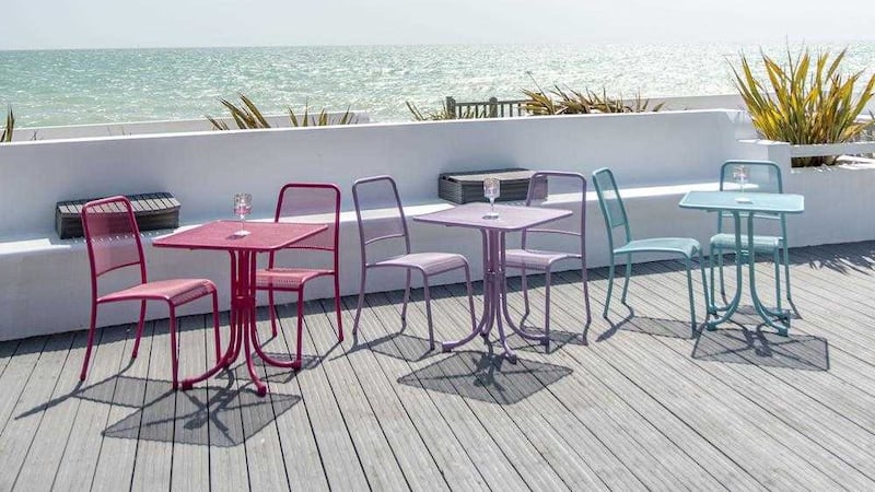 Portofino Stacking Side Chairs in Purple, Pink and Blue, &pound;145 each, and matching Bistro Tables, &pound;210 each, from the Olayinka range of metal garden furniture, available from Out There Interiors 