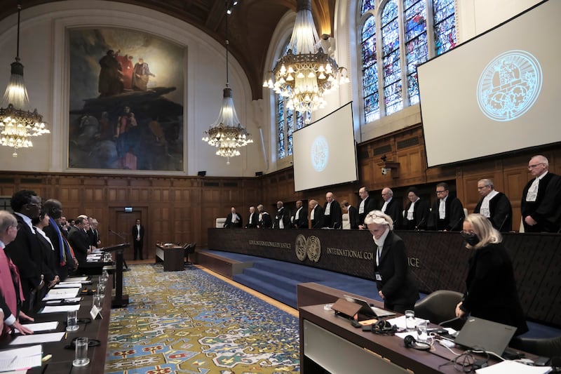 Judges and parties stand at the opening of the hearings at the International Court of Justice in The Hague, Netherlands (Patrick Post/AP)