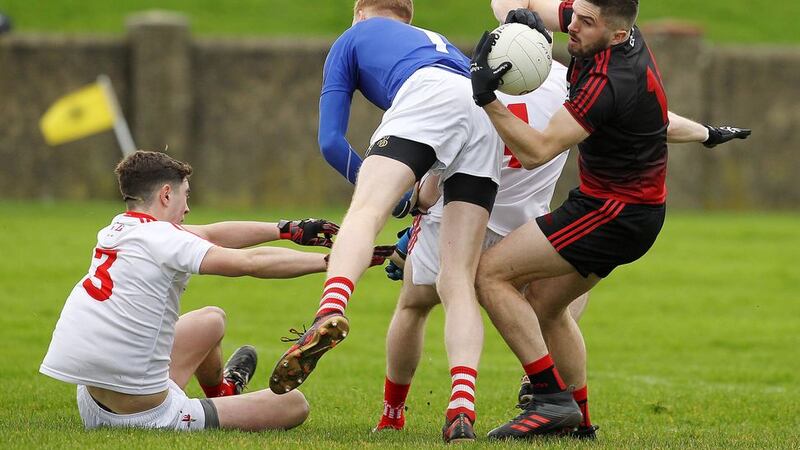 Down's Connaire Harrison takes on the Louth defence in Sunday's win in Drigheda