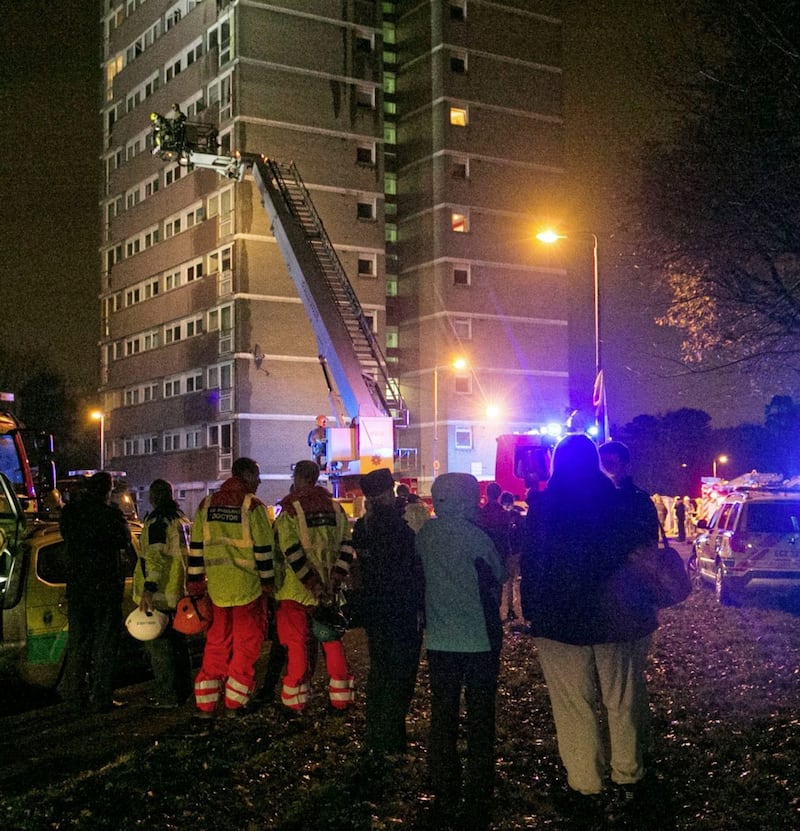 Emergency services at the scene of a fire at Coolmoyne House in Dunmurry, near Belfast, where residents have been evacuated from the building. Liam McBurney/PA Wire...