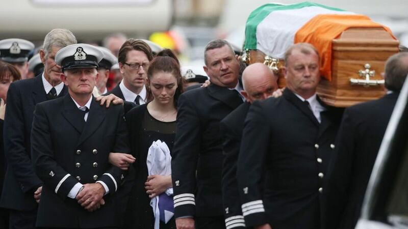 Caitriona Lucas&#39;s husband Bernard and daughter Emma follow her coffin at St Brigid&#39;s Church in Liscannor, Co Clare. Picture by Niall Carson/PA 