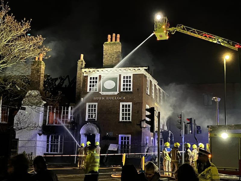 Firefighters putting out the blaze on Friday evening (David Bell/Mitcham Cricket Club)