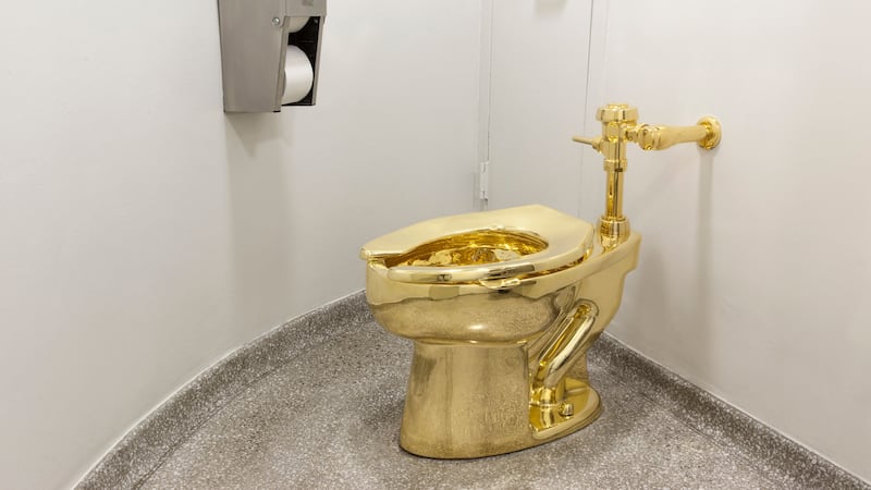 The solid gold toilet was installed in Blenheim Palace (Tom Lindboe/Blenheim Art Foundation/PA)