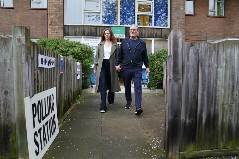 Labour leader Sir Keir Starmer and his wife Victoria leave the polling station in his Holborn and St Pancras constituency, north London, after casting their votes