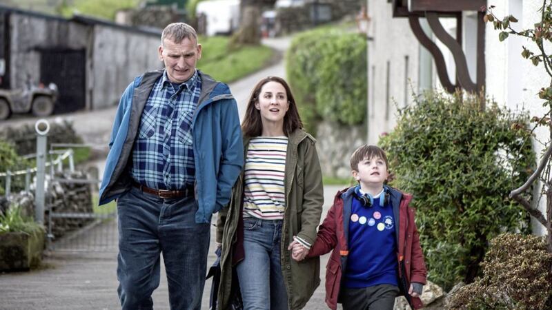 In The A Word, Joe, right, is played by Max Vento, seen here with his on-screen mum and grandfather, played by Morven Christie and Christopher Eccleston 