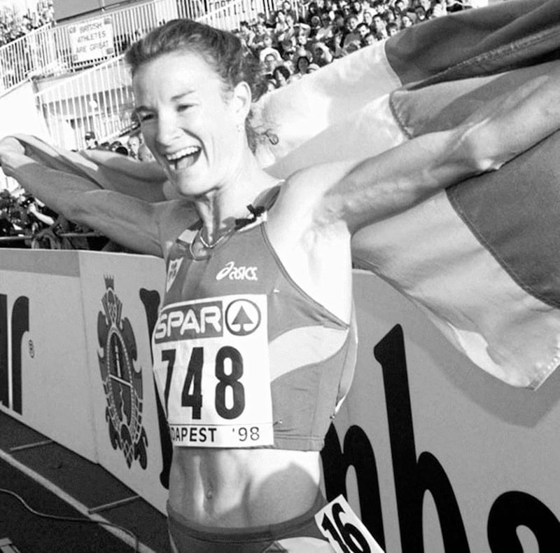 FLYING THE FLAG...Sonia O&rsquo;Sullivan celebrates yesterday after winning the 5000m at the European athletics championships to go along with her 10,000m triumph earlier in the week 