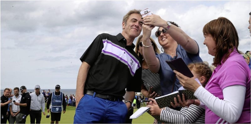 James Nesbitt poses for pictures with fans on the 9th hole at the Irish Opn Pro Am. Picture by Hugh Russell 