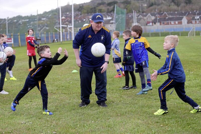Rossa coach Kevin Logan puts the kids through their paces Picture Mal McCann 