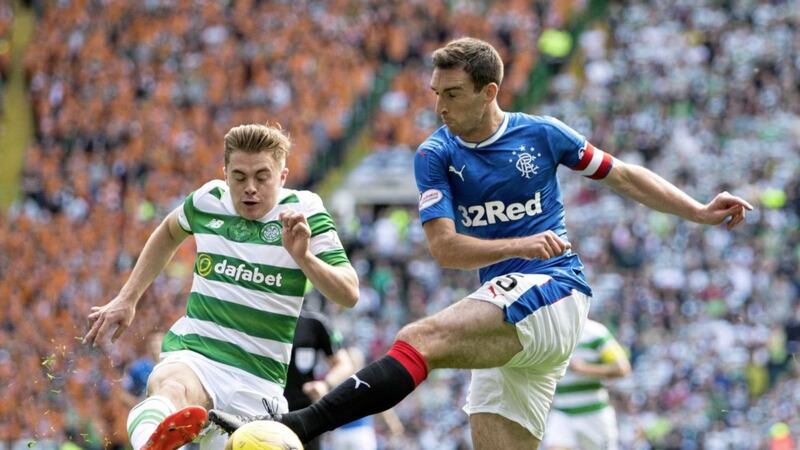 Celtic&#39;s James Forrest (left) and Rangers&#39; Lee Wallace battle for the ball during the Ladbrokes Scottish Premiership match at Celtic Park, Glasgow on Saturday September 10 2016 