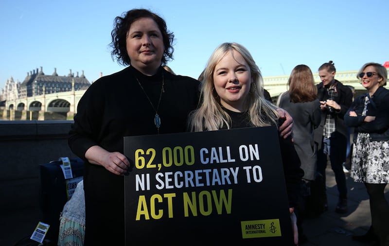 Derry Girls cast members Siobhan McSweeney and Nicola Coughlan (right) join MPS and women impacted by Northern Ireland's strict abortion laws on Westminster Bridge in London to demand legislative change&nbsp;
