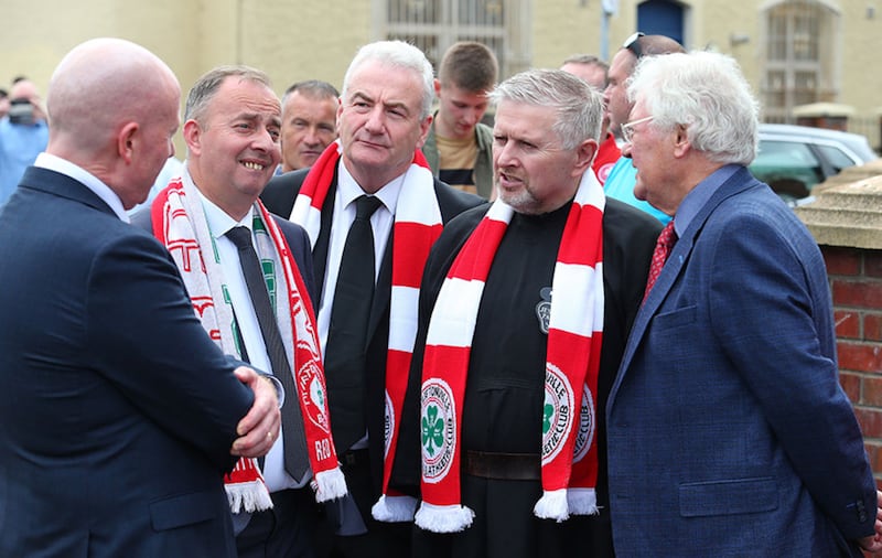 Fr Gary Donegan (second right) and Jackie Fullerton (right) at the funeral of Tommy Breslin. Picture by Mal McCann&nbsp;