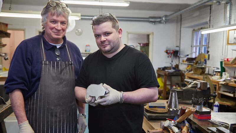 The £100,000 piggy bank, made from 18-carat gold, was created by father and son silversmiths from Bristol.