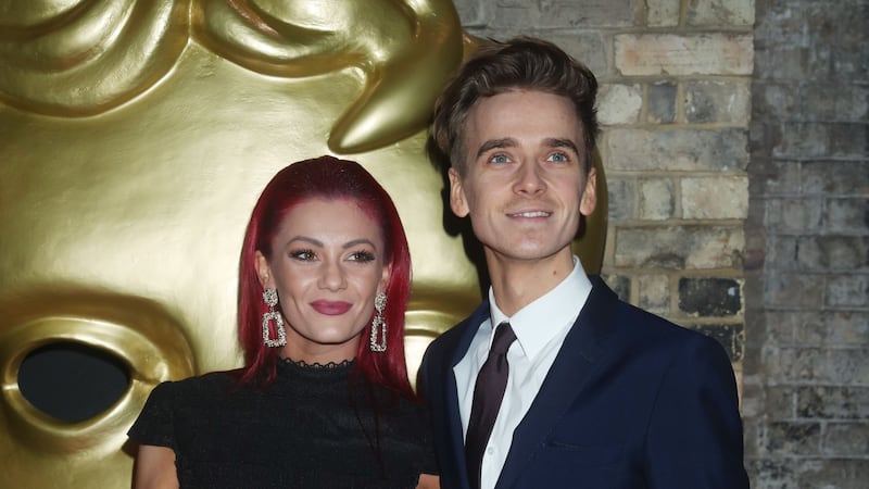 YouTuber Sugg will travel with his dancer girlfriend on her new tour.