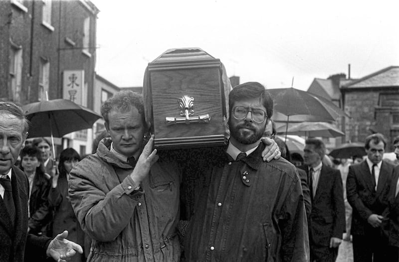 Gerry Adams and Martin McGuinness carry the coffin of Dessie Grew who was shot dead by the SAS at Loughgall. Picture by Pacemaker