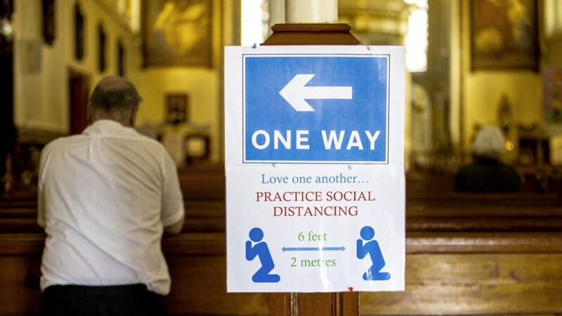 Social distancing and one-way systems, such as that established in St Mary&#39;s Church in Belfast to facilitate individual prayer, is here to stay as parishes prepare for a return to public Mass. Picture by Liam McBurney/PA Wire 