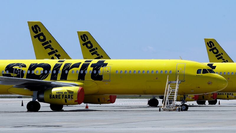Spirit Airlines planes on the tarmac at Orlando airport (Chris O’Meara/AP)