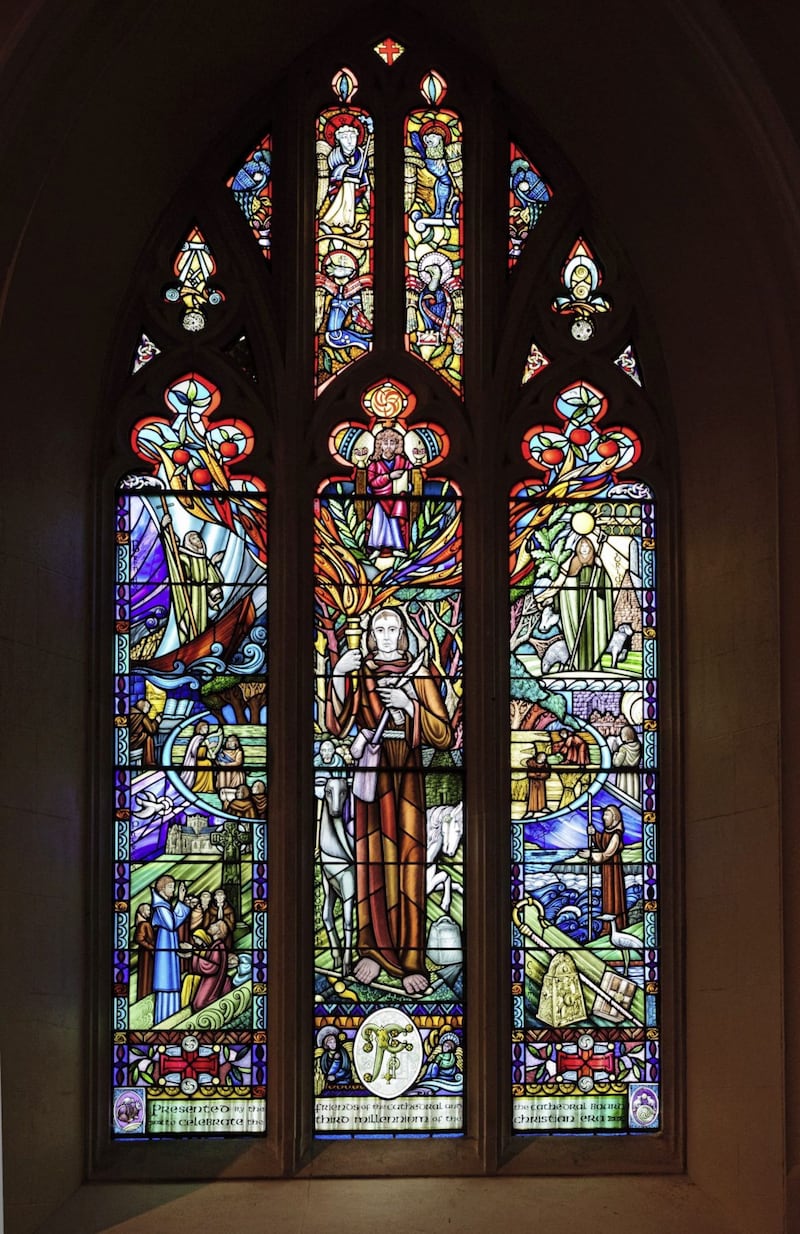 The magnificent Millennium Window in St Patrick&#39;s Church of Ireland Cathedral, Armagh, designed by David Esler. The central figure is Ferdomnach, the scribe who compiled the Book of Armagh in the 9th century, but much of the symbolism in the window is derived from the Book of Kells 