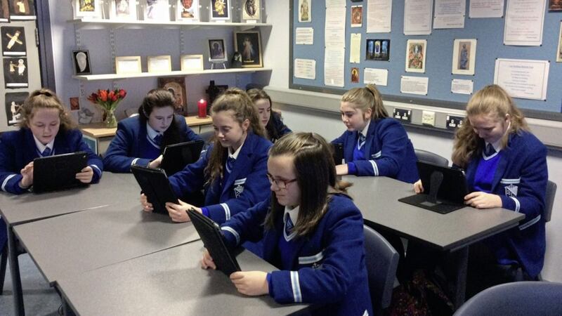 Pupils enjoying the new ibook 