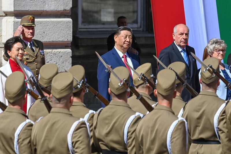 Hungarian President Tamas Sulyok receives Chinese President Xi Jinping with military honours (Zoltan Mathe/MTI via AP)