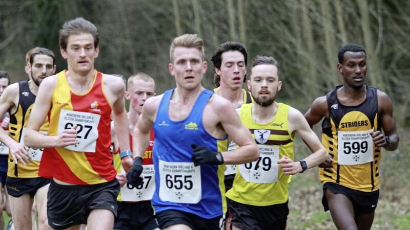 Conan McCaughey (second right) on his way to victory in the men&rsquo;s race at NI &amp; Ulster Senior Cross Country Championships 