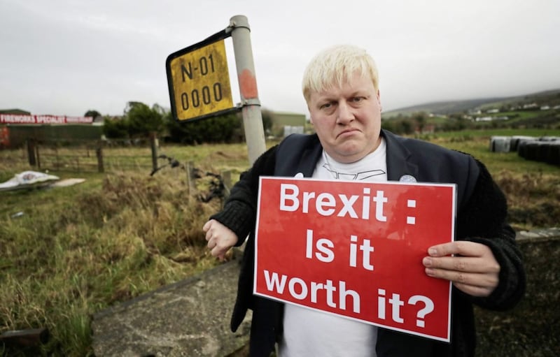 Boris Johnson lookalike Drew Galdron, who styles himself as Faux Bojo, stands on the border as the &quot;B*****ks to Brexit&quot; campaign bus stops at the border in Co Louth PICTURE: Niall Carson/PA 