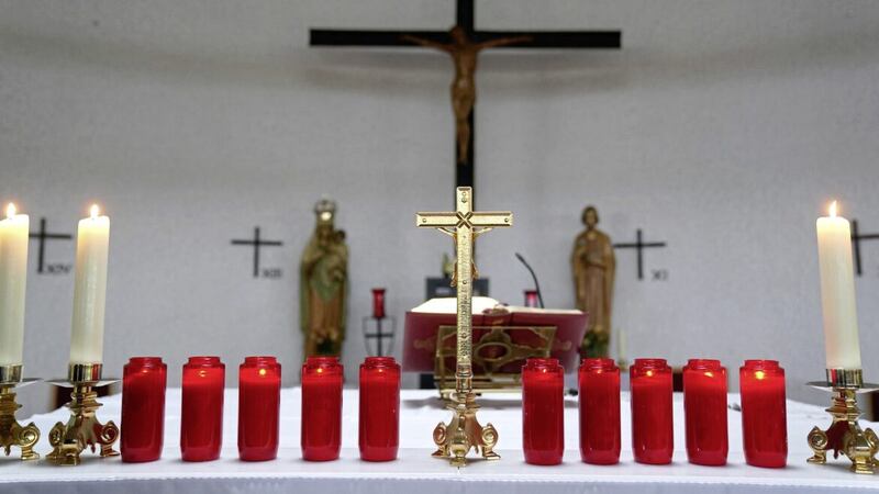 Ten red candles were lit in St Michael&#39;s Church in Creeslough, Co Donegal following the Applegreen service station explosion which claimed the lives of 10 people. Picture by Brian Lawless/PA Wire 
