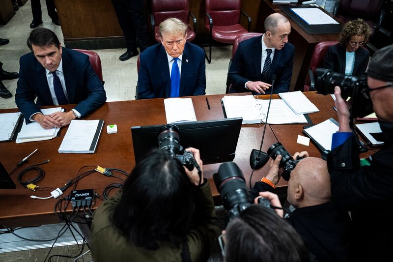 Former President Donald Trump, flanked by attorneys Todd Blanche and Emil Bove (Jabin Botsford/The Washington Post/AP)