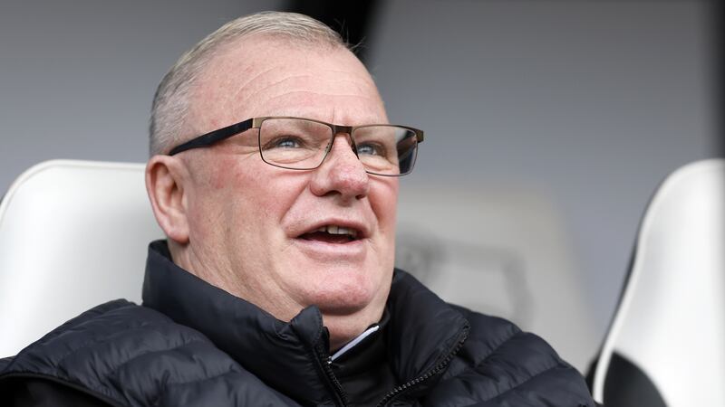 Stevenage manager Steve Evans has been charged with breaching a touchline ban