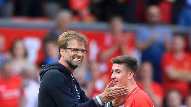 Liverpool manager Jurgen Klopp with midfielder Cameron Brannagan after last Sunday's Premier League win over Watford<br />Picture by PA&nbsp;