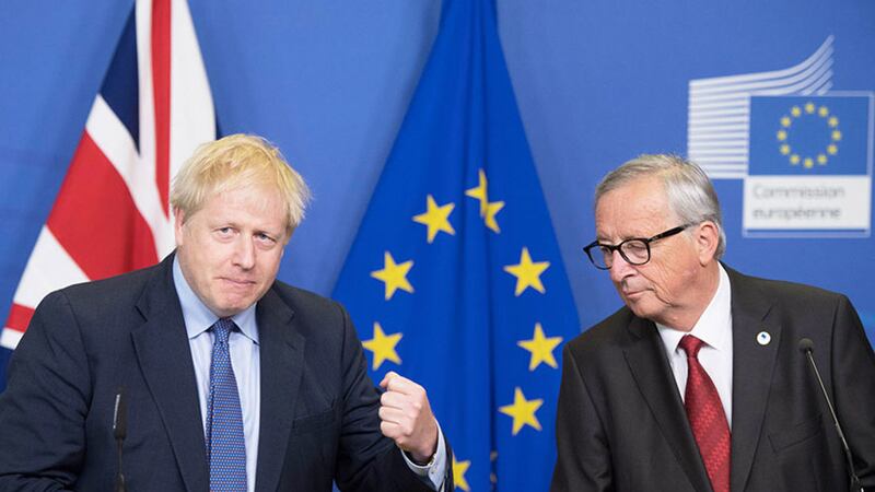 British Prime Minister Boris Johnson (left) and Jean-Claude Juncker, President of the European Commission, after the UK agreed a deal with Europe i regards to its exit from the EU. Picture by&nbsp;Stefan Rousseau/PA Wire