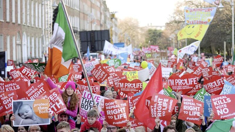 Anti-abortion protesters march through Dublin to campaign for the Eighth Amendment of the constitution to be retained in this summer&#39;s referendum. Picture by Caroline Quinn/PA 