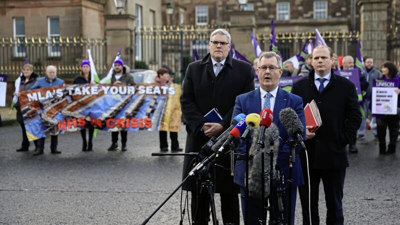 The DUP delegation of Gavin Robinson, Sir Jeffrey Donaldson and Gordon Lyons speak to media outside Hillsborough Castle after talks between secretary of state Chris Heaton-Harris and the main political parties. PICTURE: LIAM MCBURNEY/PA 
