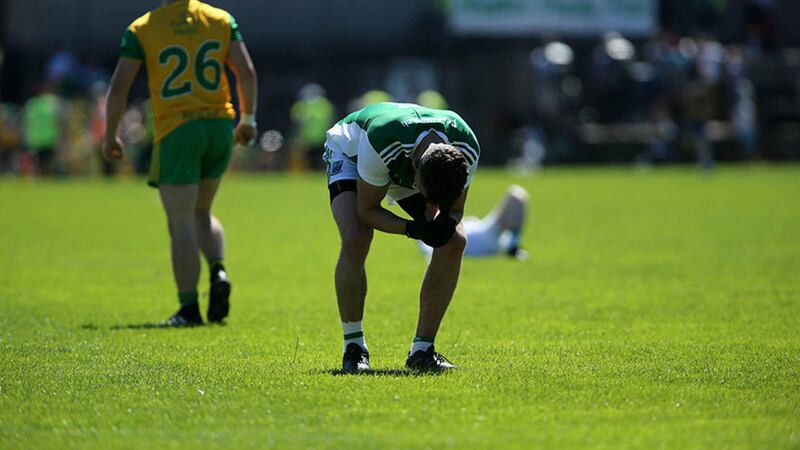 Fermanagh's James McMahon is dejected at the final whistle in Clones yesterday after their defeat to Donegal. Pic Seamus Loughran&nbsp;