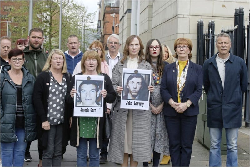 Families and survivors of the Ballymurphy massacre outside court in Belfast yesterday 