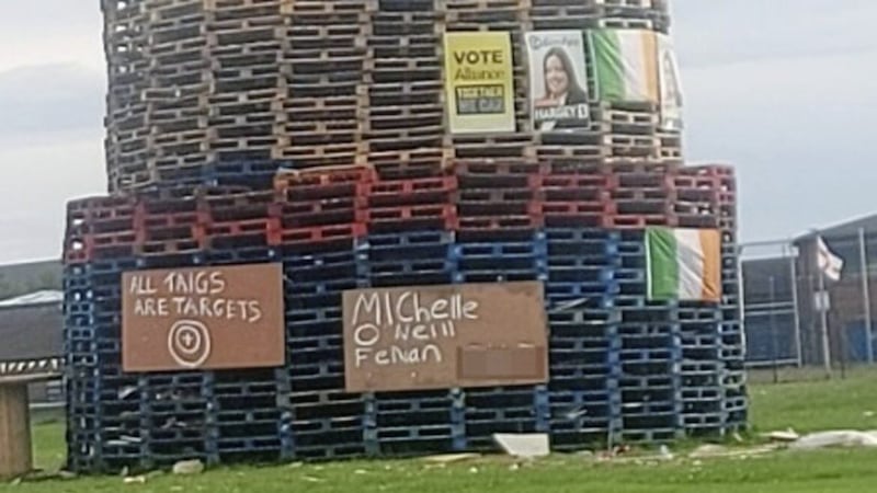 DUP assembly member David Brooks described the presence of sectarian messages - one which referred to Michelle O'Neill - and election posters on a bonfire in east Belfast as "pathetic scrawled messages"