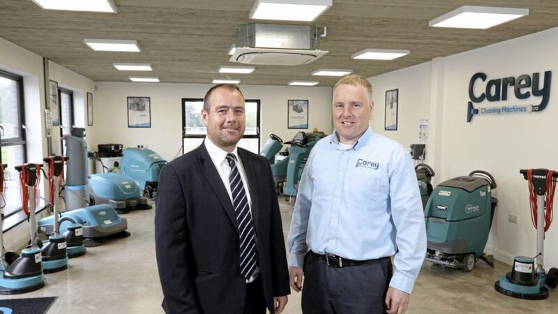 Pictured at Carey Cleaning Machines&rsquo; new Ballymena facility are Conor McNeill, business development manager at Ulster Bank and Carey&#39;s managing director William Carey 