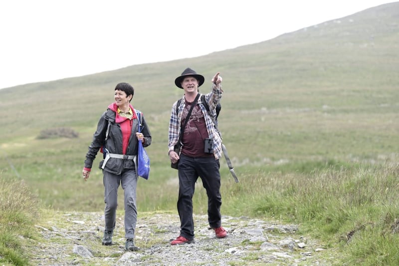 Writers Cherry Smyth and Craig Jordan-Baker walking in the Mournes. Picture by Hugh Russell 
