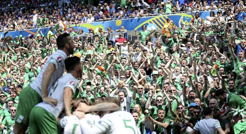 The Republic of Ireland players celebrate Robbie Brady's early penalty against France in Lyon. The Irish eventually went down 2-1