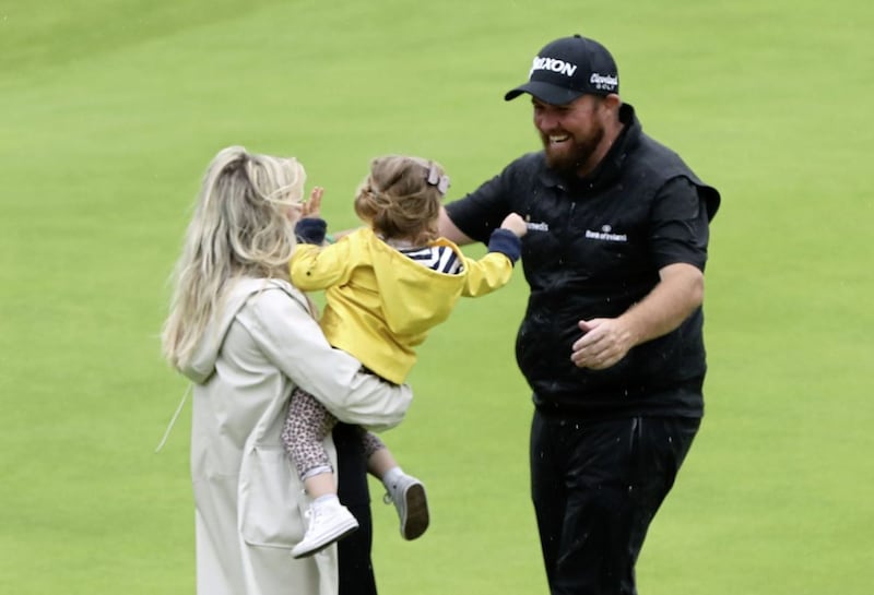               Republic Of Ireland&#39;s Shane Lowry celebrates winning the Claret Jug with wife Wendy Honner and daughter during day four of The Open Championship 2019 at Royal Portrush Golf Club. PRESS ASSOCIATION Photo. Picture date: Sunday July 21, 2019. See PA story GOLF Open. Photo credit should read: Niall Carson/PA Wire. RESTRICTIONS: Editorial use only. No commercial use. Still image use only. The Open Championship logo and clear link to The Open website (TheOpen.com) to be included on website publishing.             