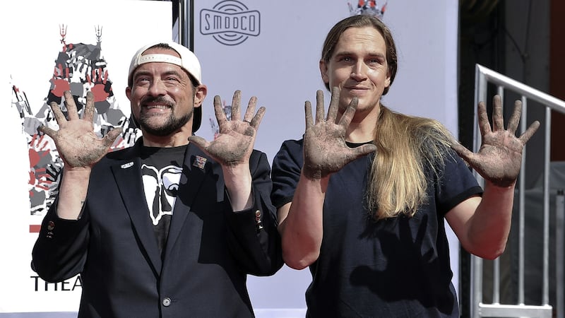 Jason Mewes and Kevin Smith placed their hand and footprints in cement outside the historic TCL Chinese Theatre.