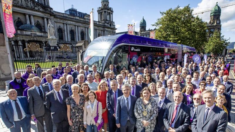 Civil service chief David Sterling, Belfast lord mayor Deirdre Hargey and Translink chief executive Chris Conway with stakeholders at the launch of the new Glider bus system. Picture by Brian Morrison 