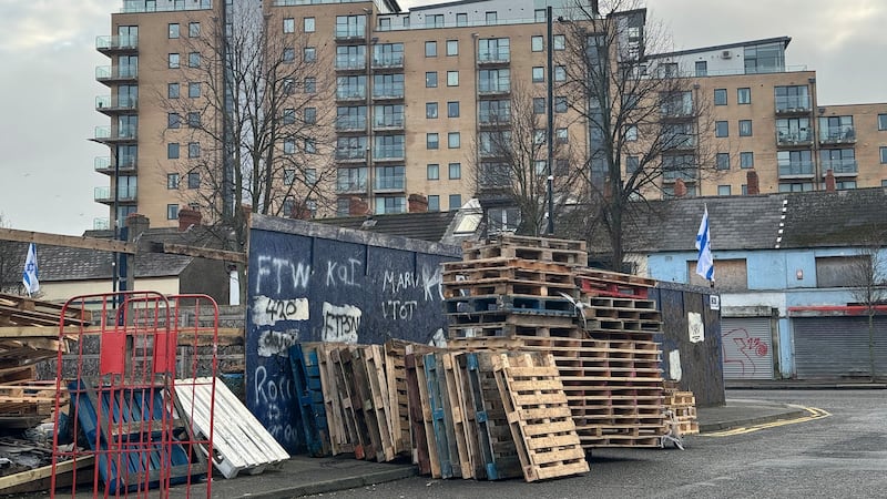 Pallets being collect for a eleventh night bonfire in the Sandy Road area south Belfast. PICTURE: MAL MCCANN