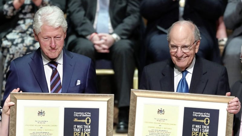 President Bill Clinton and Senator George J. Mitchell pictured during an event in Belfast to mark the 20th anniversary of the signing of the Good Friday Agreement. Picture by William Cherry/Presseye 